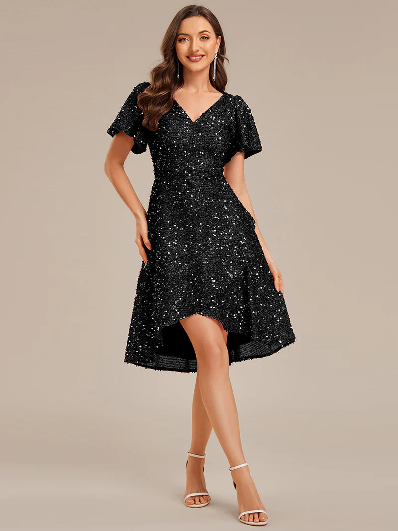 Elegant sequin high-low formal black dress featuring short ruffle sleeves and a deep V-neckline – ideal for weddings, galas, or prom nights.